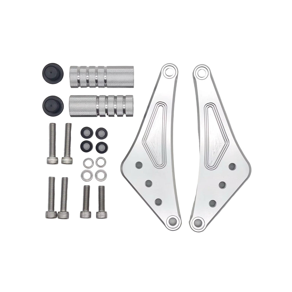 Metal brackets and screws on a gray background